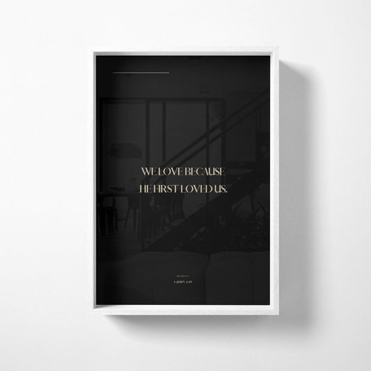 Modern Bible verse wall art with 1 John 4:19 typography in soft dark neutral tones and minimalist styling