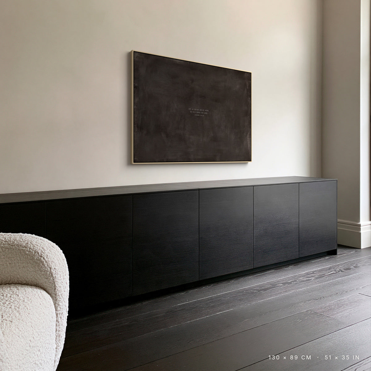 Charcoal canvas, 130 × 89 cm, natural floating frame, above a black oak sideboard in a London study