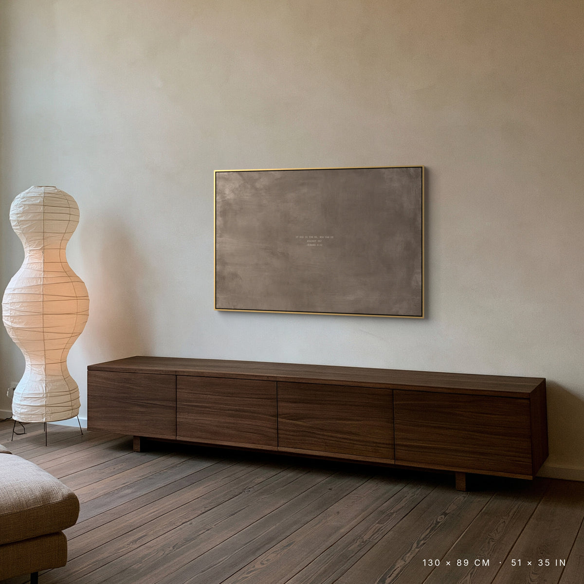 Taupe canvas, 130 × 89 cm, gold floating frame, above a smoked oak console in a Copenhagen living room